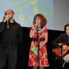 Clémentine Célarié et ses fils Abraham et Balthazar chantent à l'occasion du Festival Atmosphere à Courbevoie, le 2 Avril 2013.
