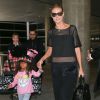 Heidi Klum arrive avec sa fille Lou à l'aéroport LAX de Los Angeles, le jour de son 8ème anniversaire de mariage avec Seal. Le 10 mai 2014.