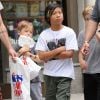 Pax Jolie-Pitt en balade à New York le 12 mai 2014, avec un passage dans la boutique Lee's Art Shop