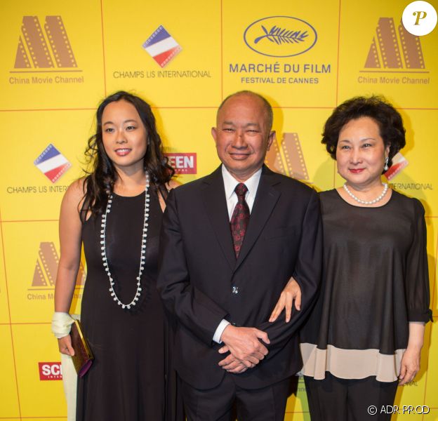 John Woo avec sa femme Annie et sa fille Wu Feixia - Soir&eacute;e d'ouverture du "March&eacute; du film" sur la plage du Majestic lors du 67e festival du film de Cannes le 15 mai 2014
