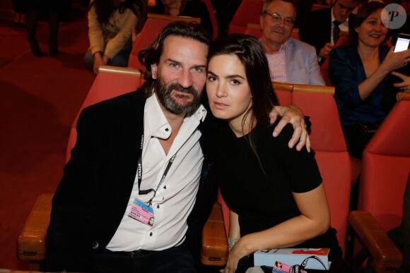 Fréderic Beigbeder et sa femme Lara Micheli  lors de l'hommage à feu Alain Resnais - qui a reçu le Carrosse d'or, durant la Quinzaine des réalisateurs, dans le cadre du Festival de Cannes le 15 mai 2014