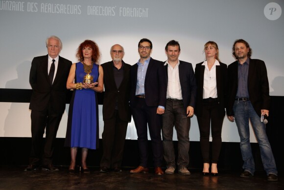 Sabine Azéma et André Dussolier lors de l'hommage à feu Alain Resnais - qui a reçu le Carrosse d'or, durant la Quinzaine des réalisateurs, dans le cadre du Festival de Cannes le 15 mai 2014