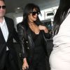 Kim Kardashian quitte l'aéroport de LAX avec sa fille North à destination de Paris, le 17 mai 2014.
