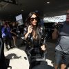 Kim Kardashian et sa fille North quittent l'aéroport de LAX à destination de Paris, le 17 mai 2014.
