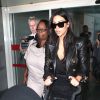 Arrivée de Kim Kardashian et sa fille North à l'aéroport de Roissy le 18 mai 2014.