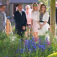 La princesse Beatrice d'York et son amie Holly Branson visitent le "Chelsea Flower Show" à Londres, le 19 mai 2014.