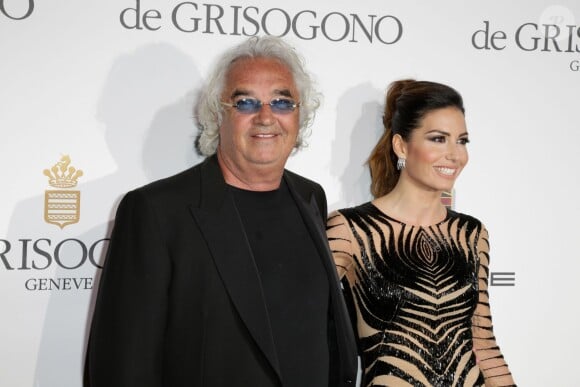 Flavio Briatore et Elisabetta Gregoraci, duo amoureux lors de la soirée de Grisogono à l'hôtel Eden Roc au Cap d'Antibes le 20 mai 2014