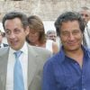 Nicolas Sarkozy et Christian Clavier en Corse le 12 septembre 2004. 