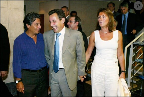 Nicolas Sarkozy avec sa femme Cécilia le 12 août 2004 en Corse.  