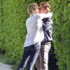 Exclusif - Charlize Theron embrasse tendrement son compagnon Sean Penn avant de quitter son domicile avec son fils Jackson à Los Angeles, le 17 mai 2014