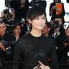 Li Yuchun - Montée des marches du film "Pour une poignée de dollars" pour la cérémonie de clôture du 67e Festival du film de Cannes le 24 mai 2014