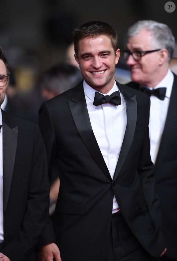 Festival de Cannes 2014 : Robert Pattinson le ténébreux laisse parfois glisser des sourires