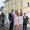 Le prince Félix de Luxembourg avec son épouse la princesse Claire, enceinte, sa soeur la princesse Alexandra et son frère le prince Sébastien réunis lors de la première communion de leur neveu le prince Gabriel de Nassau à l'église Saint-Michel de Luxembourg le 24 mai 2014.