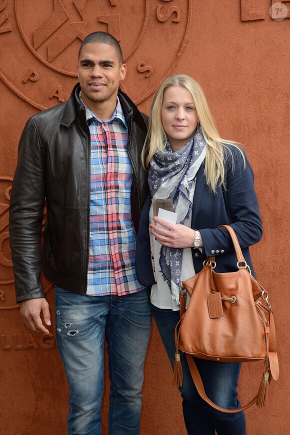 Daniel Narcisse et sa compagne Emmanuelle au Village Roland-Garros à Paris, le 27 mai 2014.
