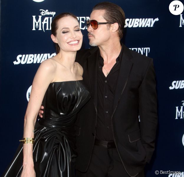 Angelina Jolie (robe Versace) et Brad Pitt - Avant-premi&egrave;re du film "Mal&eacute;fique" &agrave; Los Angeles le 28 mai 2014