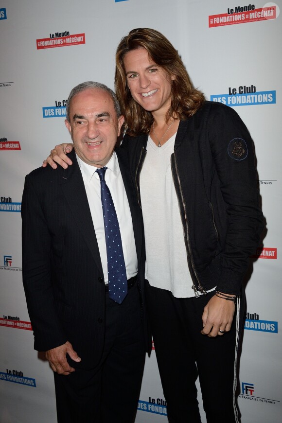 Jean Gachassin et Amélie Mauresmo lors du 1er Gala Sport et Philanthropie, à Roland-Garros le 28 mai 2014.