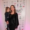 Exclusif - Isabella Orsini, princesse de Ligne de la Tremoïlle, enceinte et avec sa fille Althea, lors de la présentation du Spot "e-fluent mums", le salon des parents blogueurs, au Salon Richelieu à Paris le 4 décembre 2013.