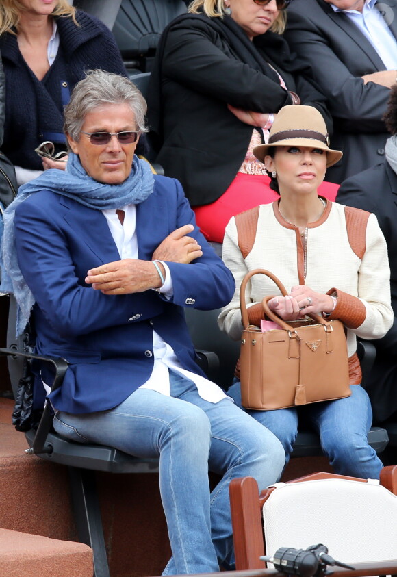 Dominique Desseigne et sa compagne Alexandra Cardinale lors des Internationaux de France à Roland-Garros à Paris, le 29 mai 2014