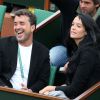 Arnaud Lagardère et sa femme Jade Foret lors des Internationaux de France à Roland-Garros à Paris, le 29 mai 2014