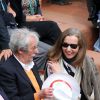 Jean Rochefort et sa femme Françoise Vidal lors des Internationaux de France à Roland-Garros à Paris, le 29 mai 2014
