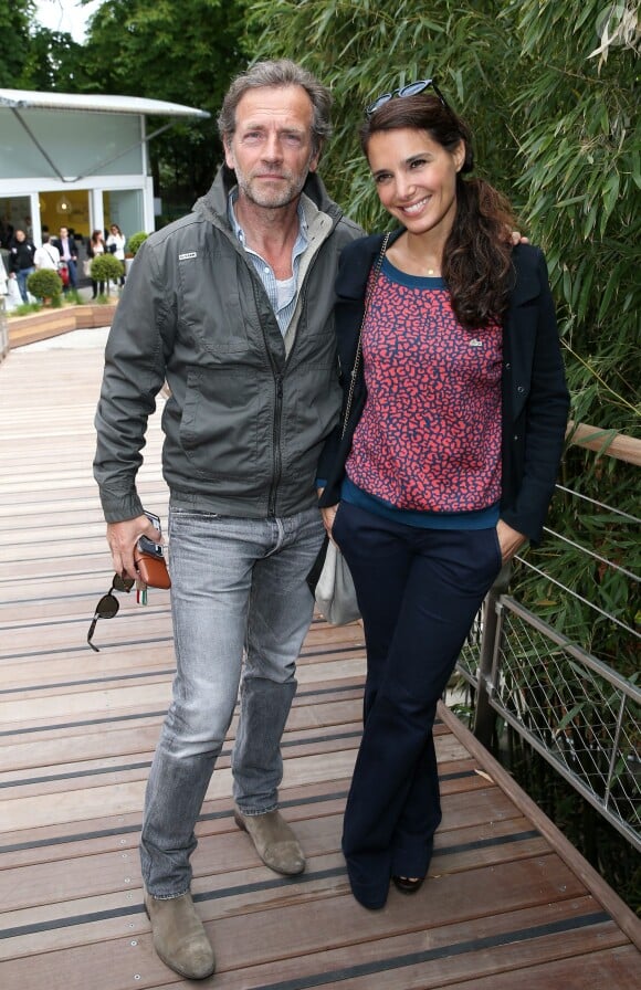 Stéphane Freiss et sa compagne Ursula lors des Internationaux de France à Roland-Garros à Paris, le 29 mai 2014