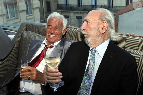 Jean Paul Belmondo et Jean Pierre Marielle participent à la soirée de Gala caritative au profit de l'association "Des Cantines Scolaires pour les Enfants du Sahel" à Cannes au Five Seas Hotel, le 31 mai 2014.