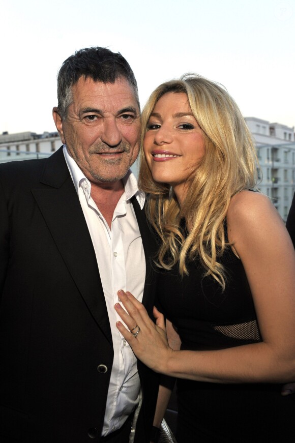 Jean Marie Bigard et son épouse Lola participent à la soirée de Gala caritative au profit de l'association "Des Cantines Scolaires pour les Enfants du Sahel" à Cannes au Five Seas Hotel, le 31 mai 2014.
