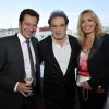 Laurent Gerra et sa compagne Christelle et Raphaël Mezrahi participent à la soirée de Gala caritative au profit de l'association "Des Cantines Scolaires pour les Enfants du Sahel" à Cannes au Five Seas Hotel, le 31 mai 2014.
