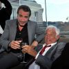 Jean Dujardin et Jean Paul Belmondo participent à la soirée de Gala caritative au profit de l'association "Des Cantines Scolaires pour les Enfants du Sahel" à Cannes au Five Seas Hotel, le 31 mai 2014.