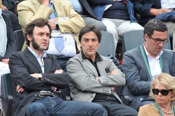 Olivier Coutard et Yvan Attal au tournoi de Roland-Garros à Paris, le 1er juin 2014.
