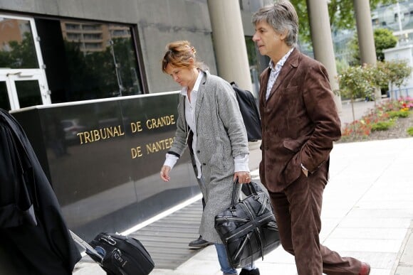 Sylvie Uderzo et son mari Bernard de Choisy au tribunal correctionnel de Nanterre pour le procès qui les oppose à son père Albert Uderzo, le 3 juin 2014.