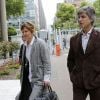 Sylvie Uderzo et son mari Bernard de Choisy arrivent au tribunal correctionnel de Nanterre pour le procès qui les oppose à son père Albert Uderzo, le 3 juin 2014.