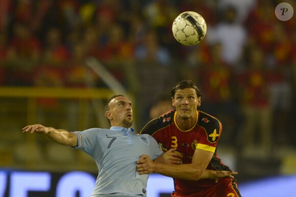France's Franck Ribery battles Belgium's Daniel Van Buyten (they play in the same Bayern german club) during a friendly football match, France vs Belgium in Stade du Roi, Brussels, Belgium on August 14th, 2013. Belgium and France drew 0-0.Photo by Henri Szwarc/ABACAPRESS.COM15/08/2013 - Brussels