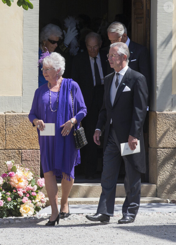 La princesse Christina et son époux Tord Magnuson au baptême de la princesse Leonore de Suède, fille de la princesse Madeleine et de Christopher O'Neill, le 8 juin 2014 en la chapelle du palais Drottningholm à Stockholm.