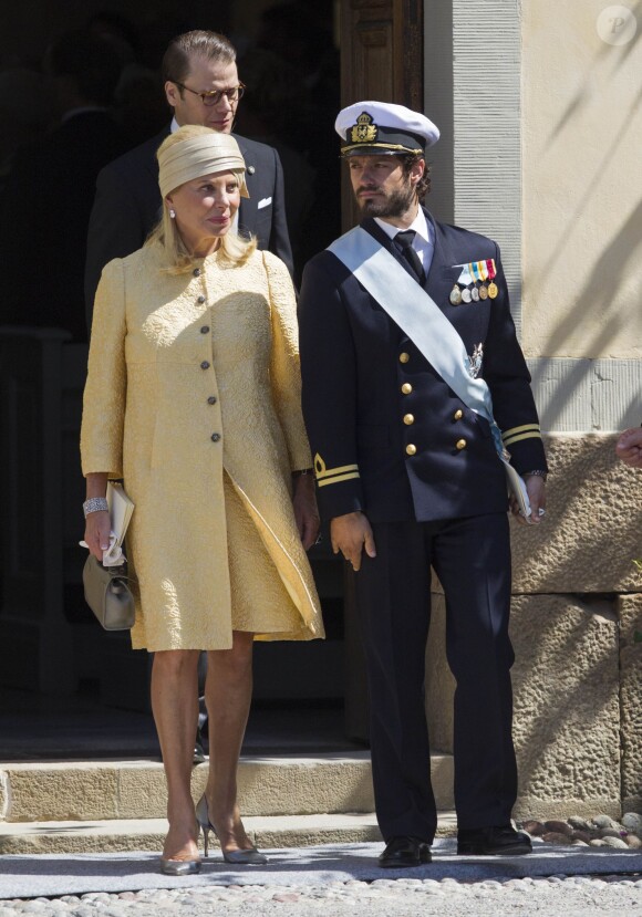 Eva O'Neil et le prince Carl Philip au baptême de la princesse Leonore de Suède, fille de la princesse Madeleine et de Christopher O'Neill, le 8 juin 2014 en la chapelle du palais Drottningholm à Stockholm.