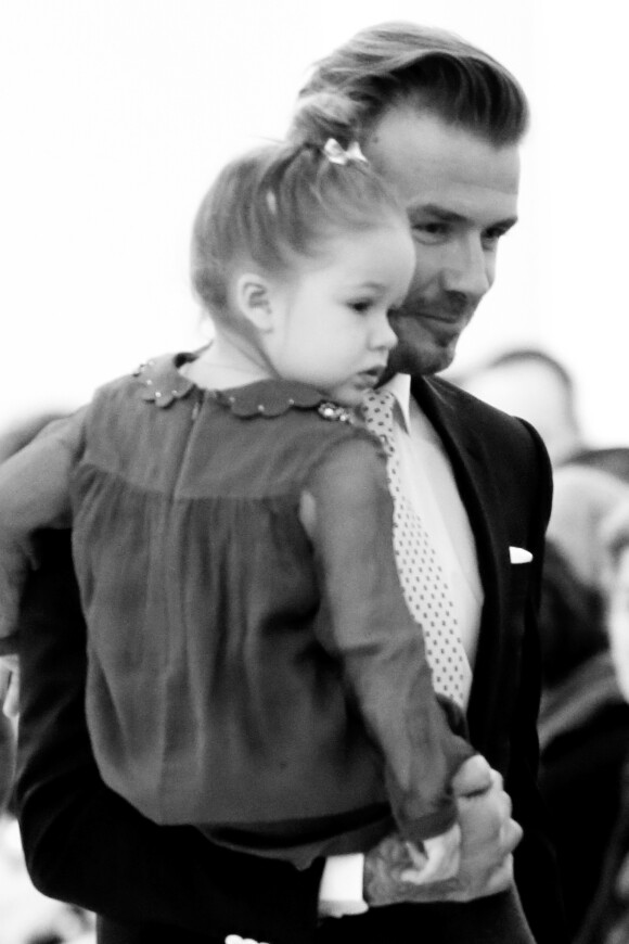 David Beckham et sa petite Harper en février 2014 lors du défilé de Victoria Beckham à New York