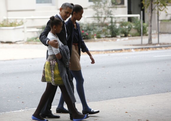 Barack Obama et ses filles Sasha et Malia photographiés à Washington en octobre 2012