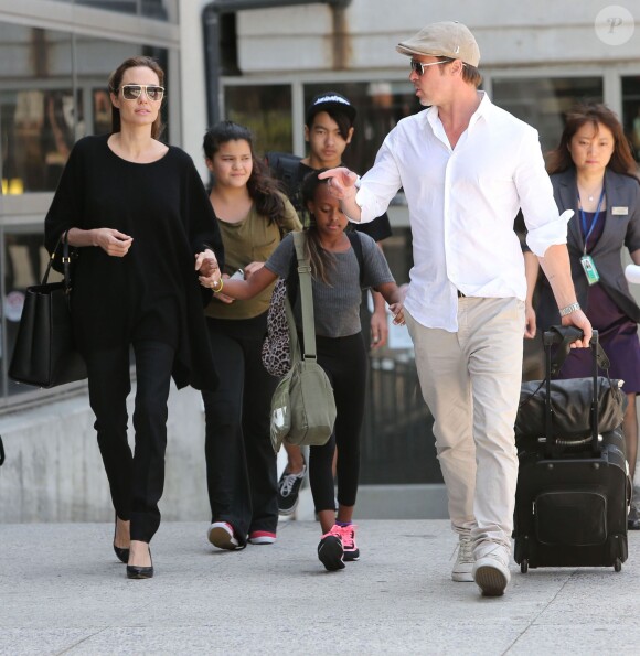 Angelina Jolie de retour à Los Angeles le 14 juin 2014 après avoir pris part au Sommet sur les violences sexuelles en zone de conflits.