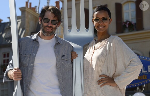 Jalil Lespert et sa compagne Sonia Rolland assistent en avant-première à l'inauguration de la nouvelle attraction Ratatouille, à Disneyland Paris, à Marne-la-Vallée, le 21 juin 2014.