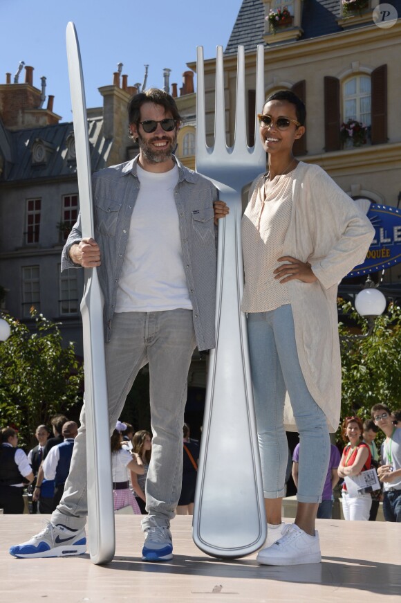 Jalil Lespert et sa compagne Sonia Rolland assistent en avant-première à l'inauguration de la nouvelle attraction Ratatouille, à Disneyland Paris, à Marne-la-Vallée, le 21 juin 2014.