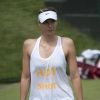 Maria Sharapova lors de son entraînement avant son entrée en lice dans le tournoi de tennis de Wimbledon le 23 juin 2014