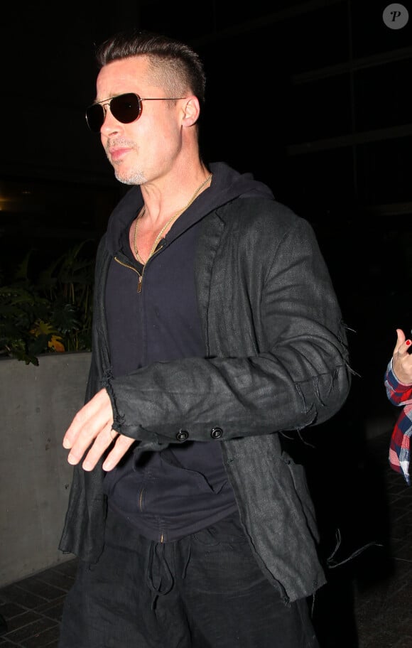 Brad Pitt, avec sa nouvelle coupe de cheveux, à Los Angeles, le 17 janvier 2014. 