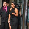 Kim Kardashian, ultrasexy dans une robe fendue Balmain et des sandales Tom Ford, quitte le Gansevoort avec ses soeurs Kourtney, Khloé et Kendall, et leur mère Kris Jenner. New York, le 26 juin 2014.