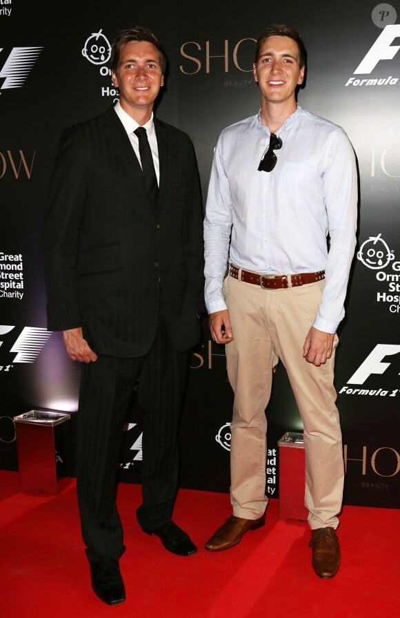 James Phelps et Oliver Phelps lors de la soirée de charité F1 au V&A Museum de Londres, le 2 juillet 2014.