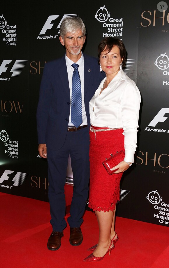 Damon Hill et Susan George lors de la soirée de charité F1 au V&A Museum de Londres, le 2 juillet 2014.