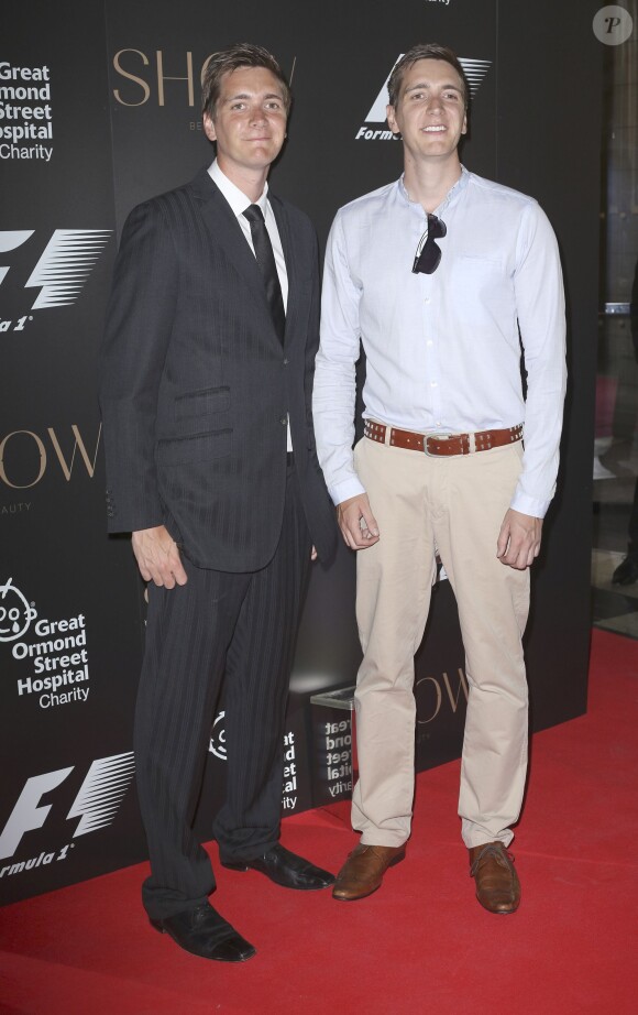 James et Oliver Phelps lors de la soirée de charité F1 au V&A Museum de Londres, le 2 juillet 2014.