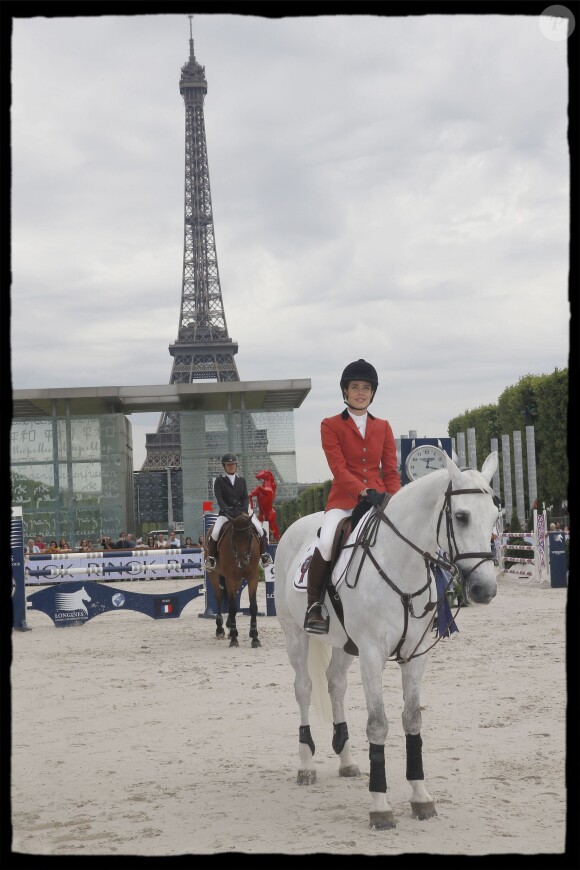 Charlotte Casiraghi au Paris Eiffel Jumping, présenté par Gucci, au Champ de Mars à Paris le 4 juillet 2014.