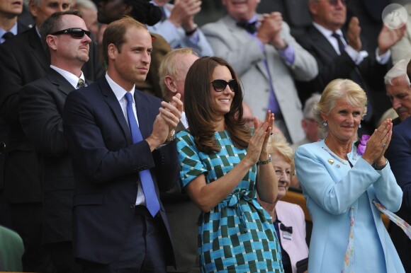 Le prince William et son épouse Catherine ont assisté depuis la Royal Box du Centre Court de Wimbledon le 6 juillet 2014, à la finale entre Novak Djokovic et Roger Federer