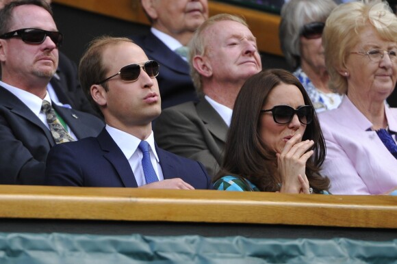 Le prince William et son épouse Catherine dans la Royal Box du Centre Court de Wimbledon, le 6 juillet 2014, lors de la finale entre Novak Djokovic et Roger Federer