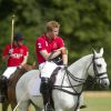 Le prince Harry disputait le 12 juillet 2014 la Hackett Rundle Cup de polo dans le Wiltshire.